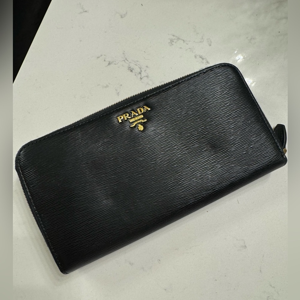 Prada black leather zippy wallet